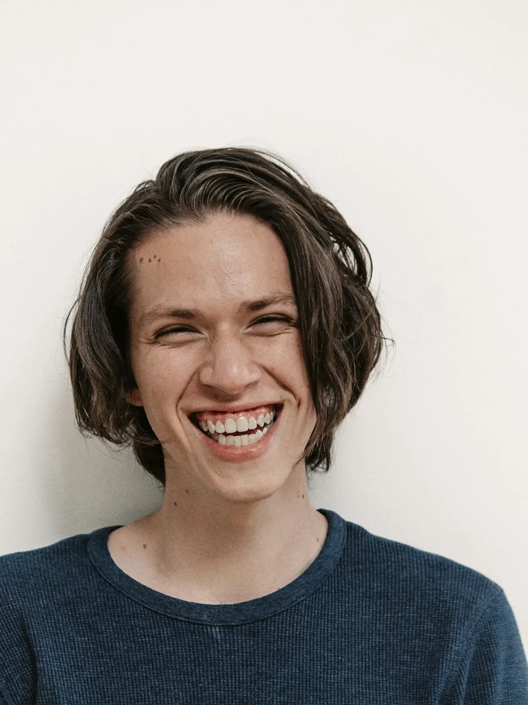 Patient laughing with a confident smile